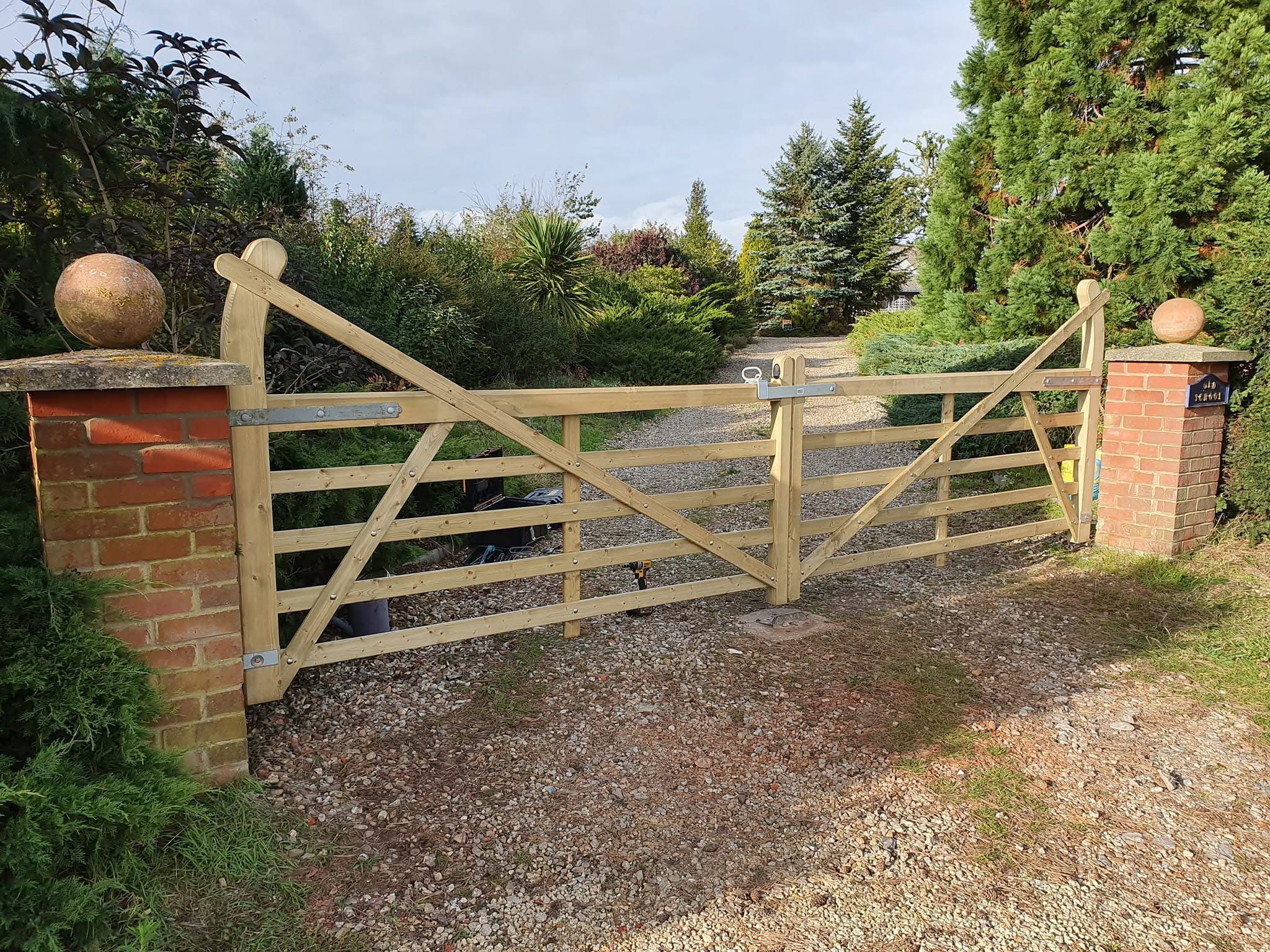 Painted Garden Gate — AG Landscaping